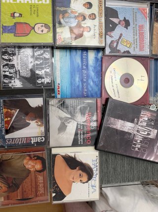 Lote de 12 CDs y DVDs de Música
