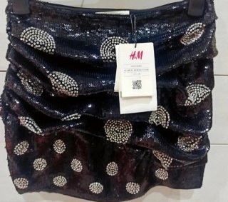 Minifalda lentejuelas y strass.