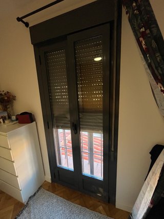 Ventana de doble hoja oscilobatiente