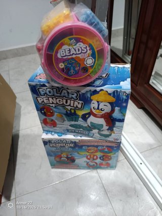 Lote de Juguetes: Polar Penguin y Beads Set