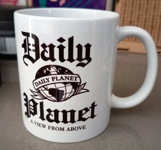 Taza Daily Planet de cerámica