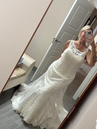 Traje de novia blanco con encaje