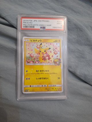 Carta Pokémon Pikachu 20th Anniversary PSA 9
