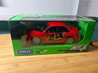 Modellino auto Subaru Impreza WRX STI Welly in scala 1:24