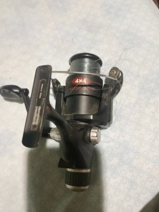 Carrete de pesca Decathlon 4x4
