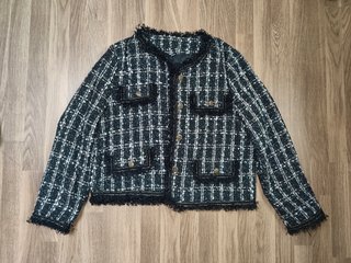 Chaqueta tipo tweet en negro y blanco