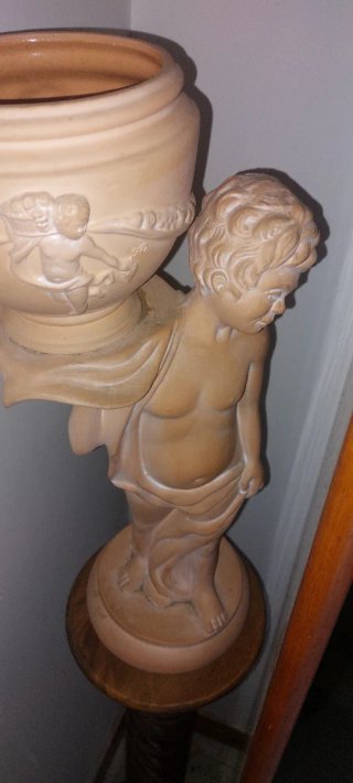 Scultura decorativa in terracotta