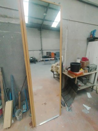 Espejo de 4mm  sobre  panel de melamina 227x62