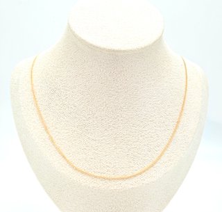 Cadena Barbada de oro de 18k, 1.22 g, 37 cm.