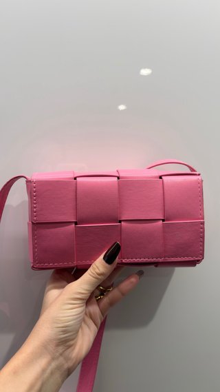 Borsa a tracolla intrecciata rosa