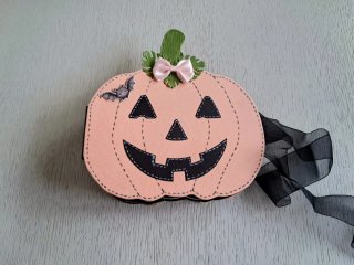 Álbum de Halloween con forma de calabaza