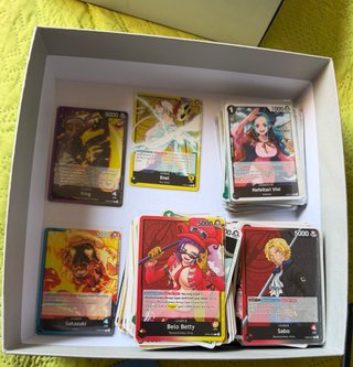 Lote de más de 304 cartas de One Piece + 44 holo