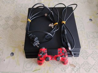 PS4 (PlayStation 4) Pro con mando +15 juegos