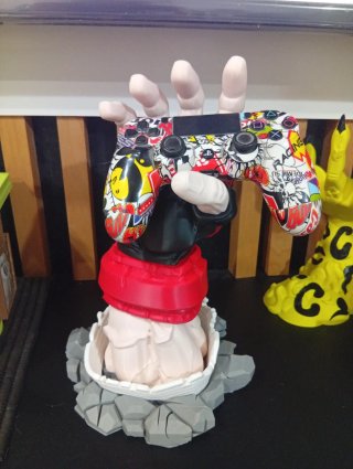 Soporte para mando impreso en 3D
