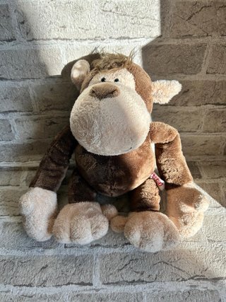 Peluche scimmia marrone