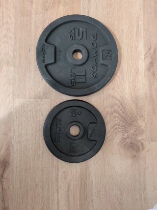 Discos de pesas Domyos (2 x 5kg y 4 x 2kg)