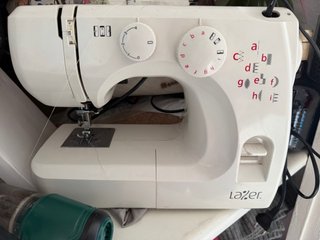 Máquina de coser Lazer