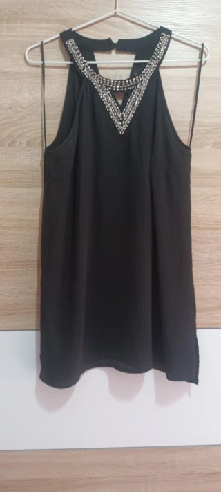 Camisa negra con abalorios