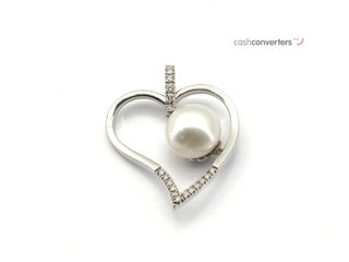colgante oro 18k con piedra con diamante