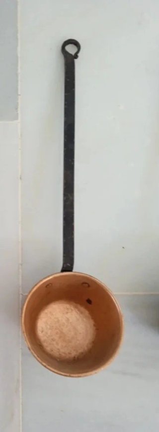 Cazo antiguo de metal