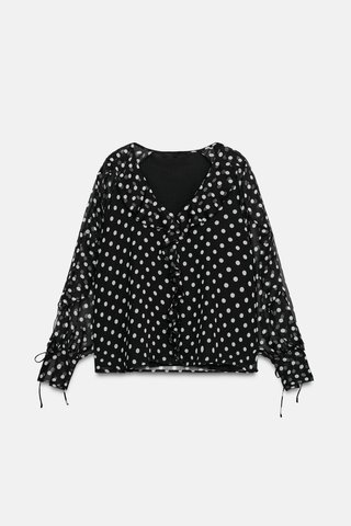 Blusa de lunares con volantes