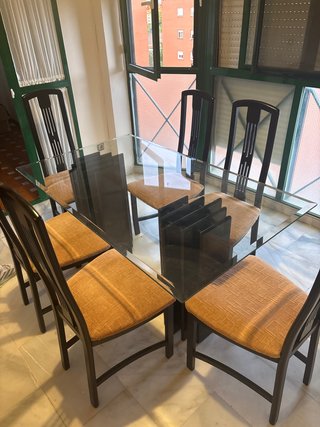 Conjunto de mesa de cristal y 6 sillas