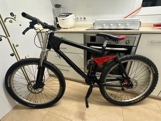 Bicicleta de Montaña kona, Doble Suspensión