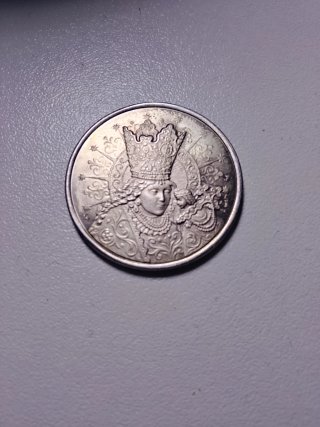 Moneda de Plata con Relieve