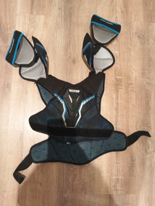 Peto de protección Bauer para hockey patines