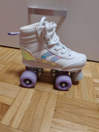 Patines de 4 Ruedas Blancos. Con mochila