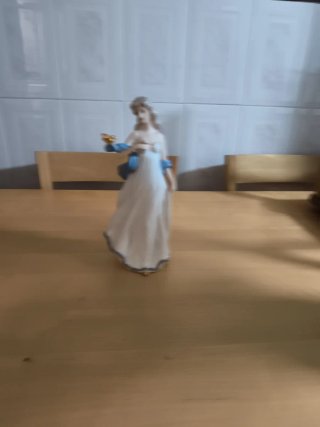 Estatua Decorativa de Porcelana