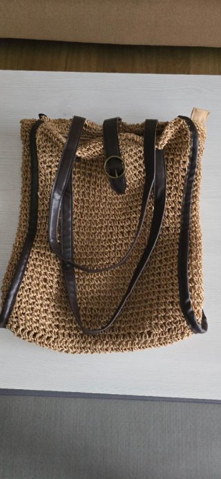 Bolso de mano trenzado