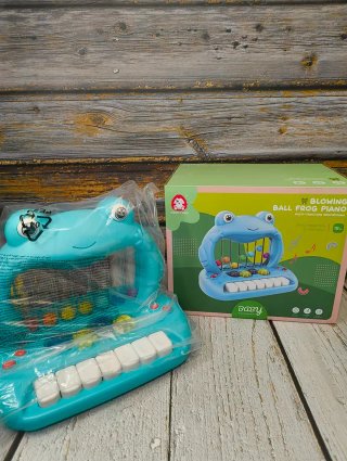 Piano Musical Rana con Pelotas Flotantes