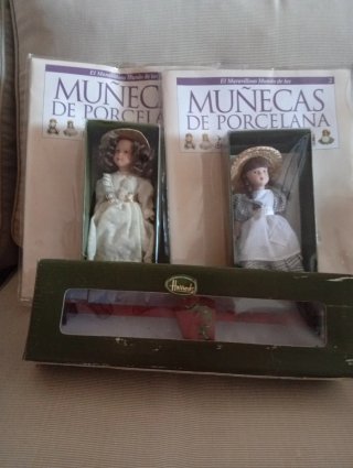 Bambole di porcellana con accessori