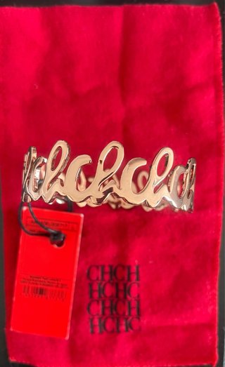 Pulsera Carolina Herrera Dorada