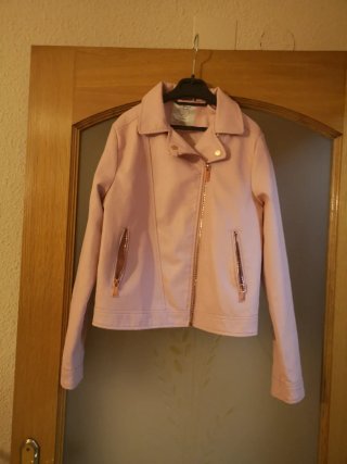 Cazadora rosa de polipiel Primark talla 12 años