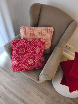 Cojines Navideños en tonos Rojos.