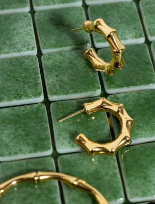Pendientes de aro acero baño oro 18 quilates