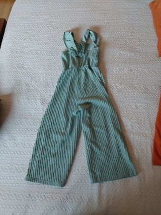 Mono de niña plisado verde
