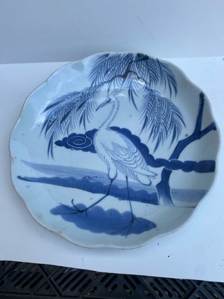 Antiguo Plato de cerámica artesanal con garza,leer