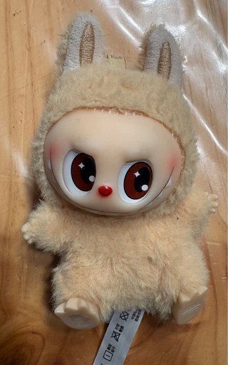 Muñeco Bubu con disfraz de peluche