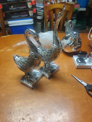 Pareja de Figuras de Aves Plateadas