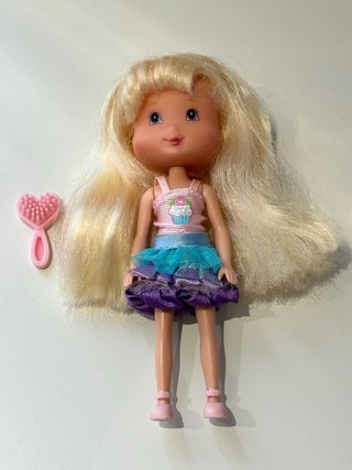 Muñeca con peine