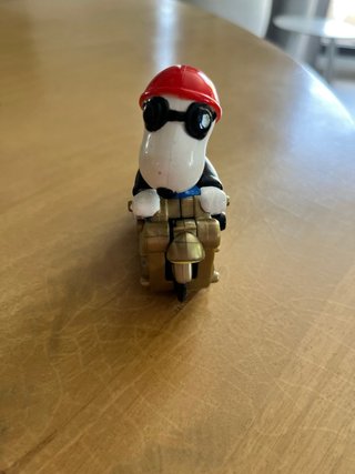 Figura Snoopy en Motocicleta