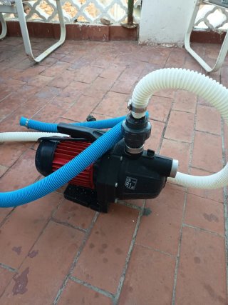 Bomba de agua con mangueras