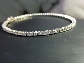 Pulsera tipo tenis plateada