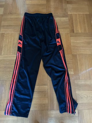 Pantalón de chándal Adidas negro y naranja