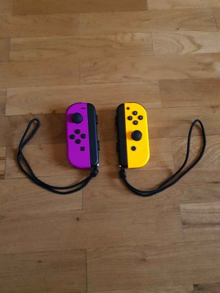 JOY-CON NINTENDO SWITCH · AMARILLO Y MORADO