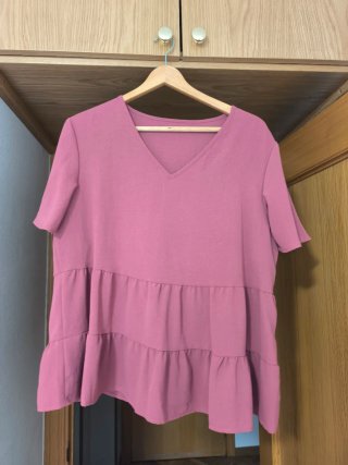 Blusa rosa con volantes