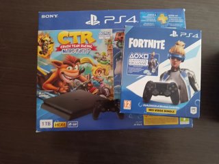 PS4 (PlayStation 4) Slim 1TB con pak multijuegos
